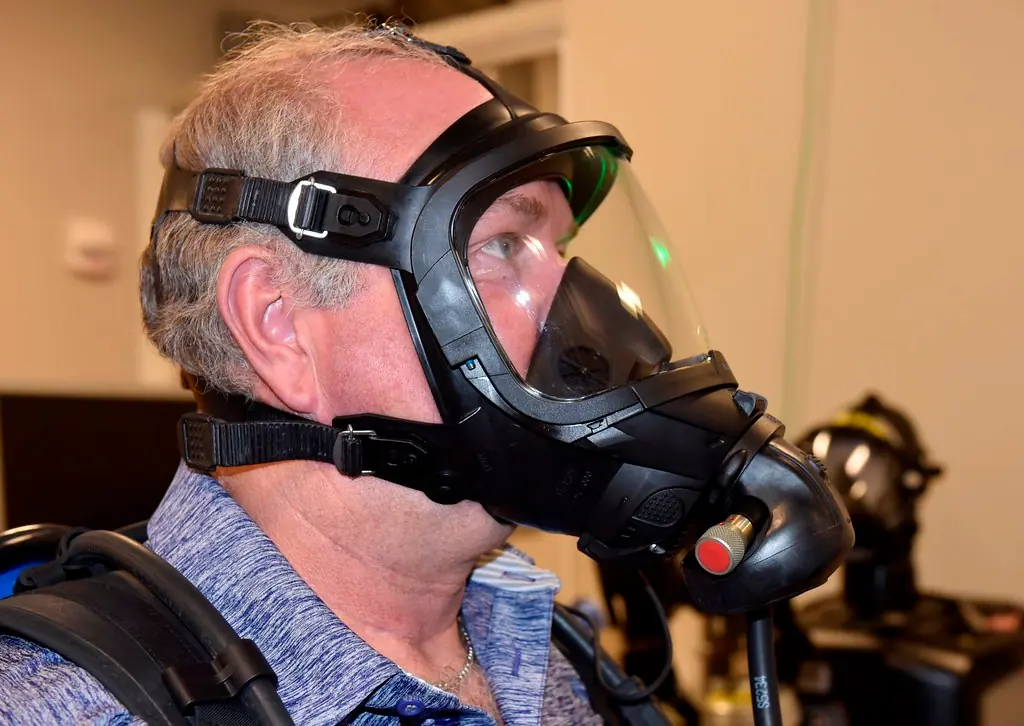 Nova Energy employee wearing full-face respiratory protection